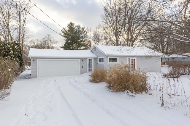 single story home with a garage