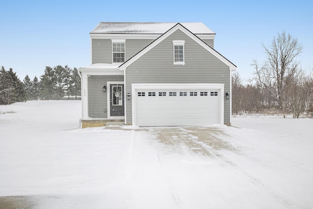 front of property featuring a garage