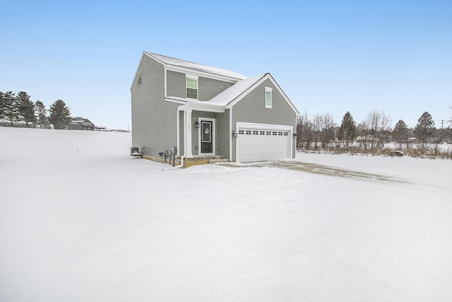 front of property featuring a garage