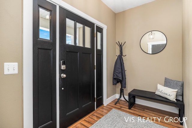 9340 Freedom Dr, West Olive, MI 49460 - foyer entrance featuring light wood-style floors and baseboards