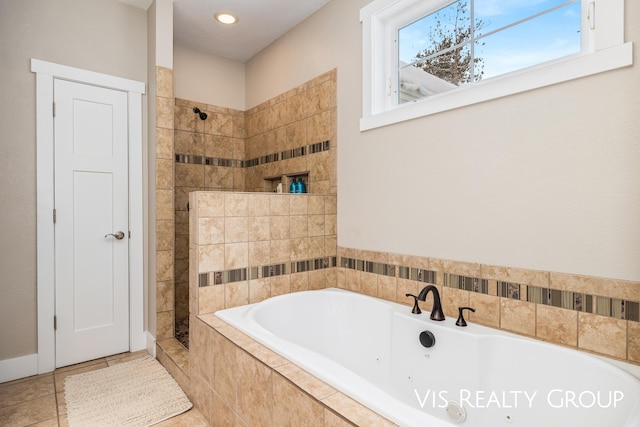 9340 Freedom Dr, West Olive, MI 49460 - bathroom with a whirlpool tub, tile patterned floors, and a walk in shower
