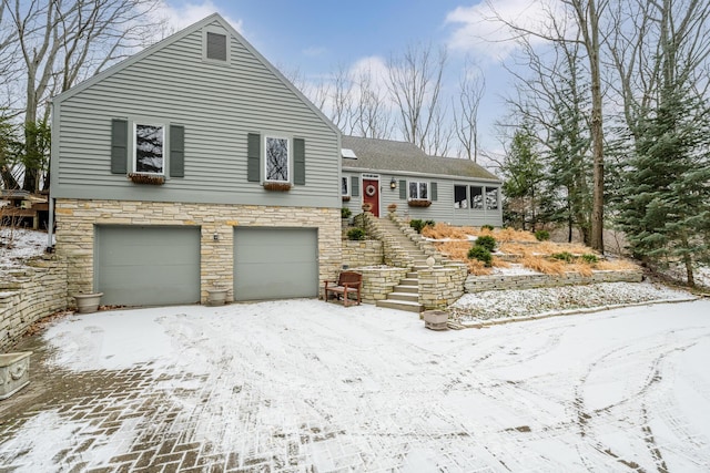 split level home with a garage