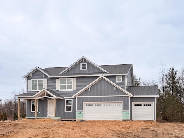 view of front of home with a shingled roof, board and batten siding, and dirt driveway