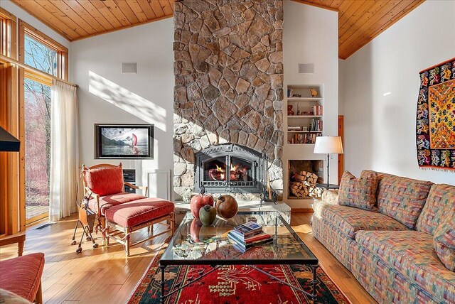 43162 Whispering Pines Path, Coloma, MI 49038 - living area with ornamental molding, visible vents, wooden ceiling, and hardwood / wood-style flooring