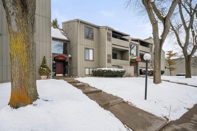 view of snow covered property