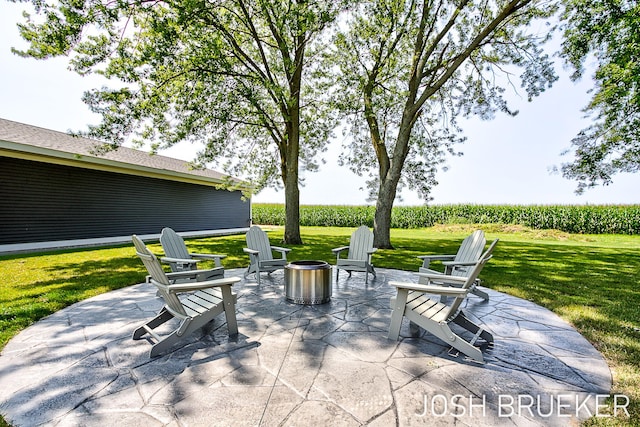 view of patio featuring a fire pit