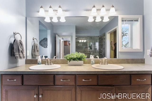 bathroom with vanity and an enclosed shower