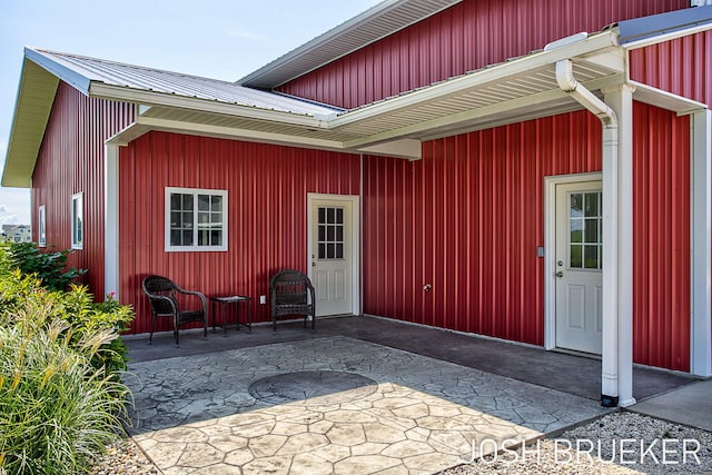 entrance to property with a patio