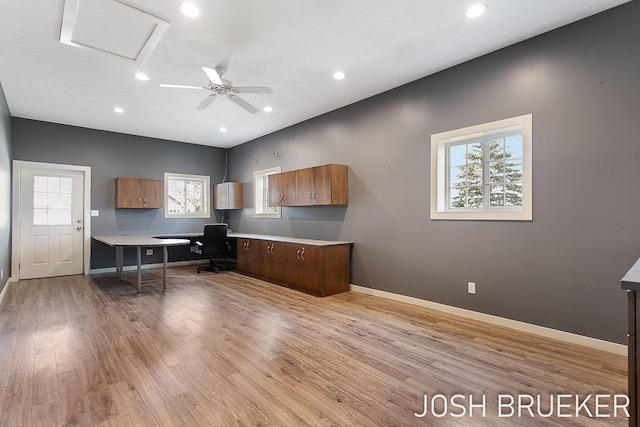 office area featuring light hardwood / wood-style flooring and ceiling fan