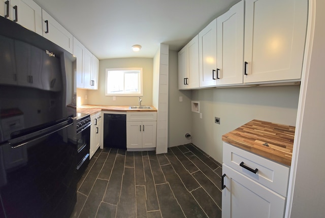 kitchen with black appliances, butcher block counters, and white cabinets