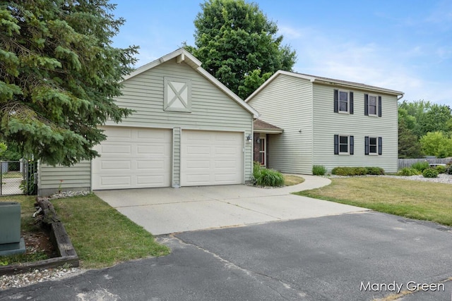 366 E Beech St NE, Cedar Springs, MI 49319 - traditional-style house featuring driveway and a garage