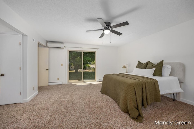 366 E Beech St NE, Cedar Springs, MI 49319 - bedroom featuring a wall mounted AC, access to exterior, carpet floors, a baseboard heating unit, and a ceiling fan