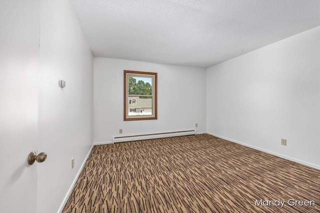 366 E Beech St NE, Cedar Springs, MI 49319 - carpeted empty room with baseboard heating and a textured ceiling