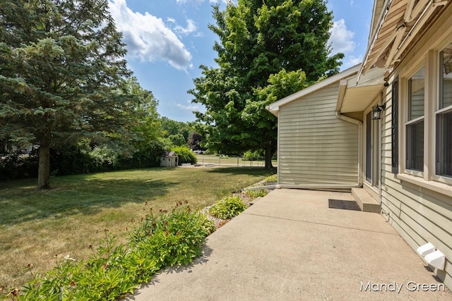 366 E Beech St NE, Cedar Springs, MI 49319 - view of green lawn with a patio