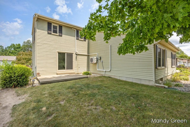 366 E Beech St NE, Cedar Springs, MI 49319 - back of property with a lawn and a patio