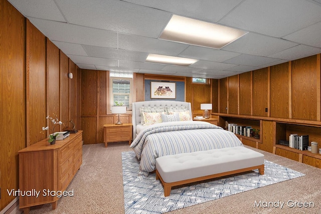 366 E Beech St NE, Cedar Springs, MI 49319 - bedroom featuring light colored carpet, wooden walls, and a paneled ceiling