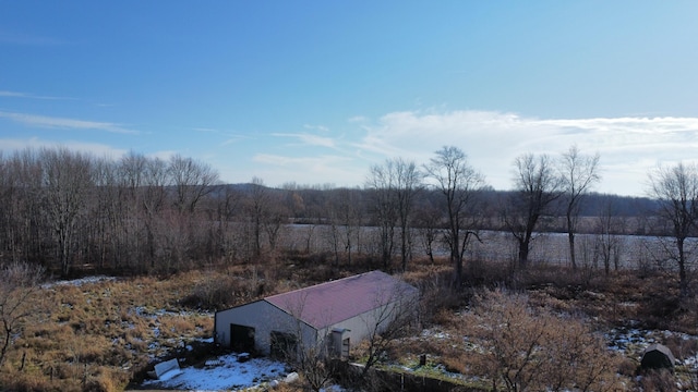 exterior space with a rural view