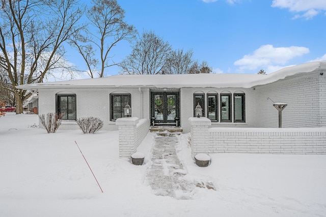 view of front of property with brick siding