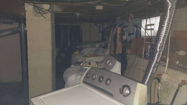 basement with separate washer and dryer