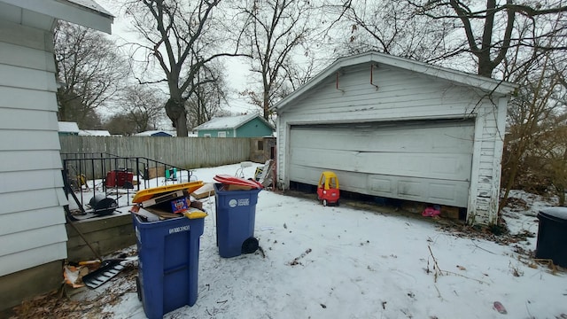 view of snow covered garage