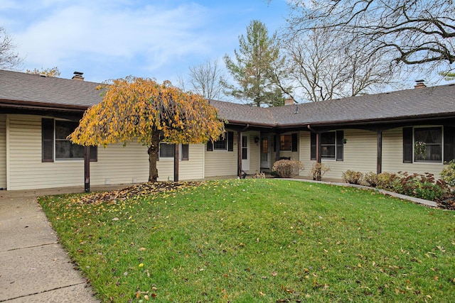 ranch-style house with a front yard