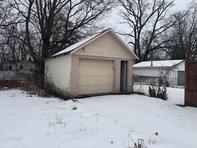 view of snow covered garage