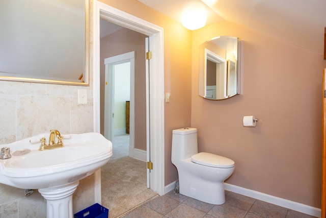 bathroom featuring sink and toilet