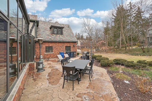 view of patio / terrace featuring grilling area and outdoor dining area