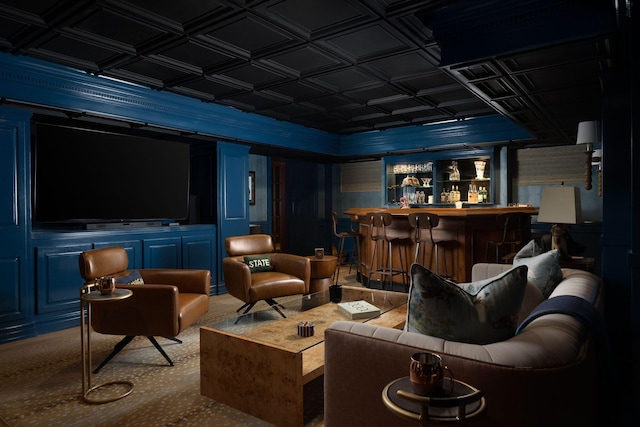cinema with bar area and an ornate ceiling