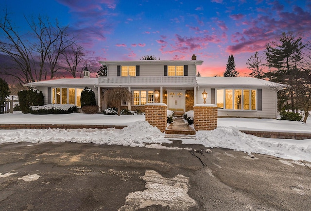 view of front of home with a chimney