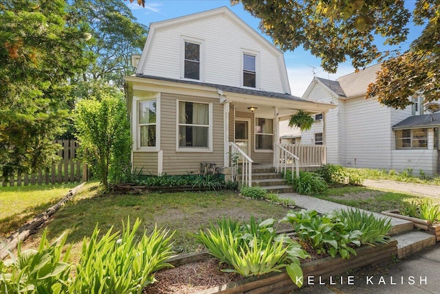 324 Gunnison Ave SW, Grand Rapids, MI 49504 - dutch colonial with a gambrel roof and covered porch