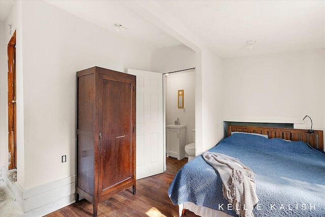 324 Gunnison Ave SW, Grand Rapids, MI 49504 - bedroom featuring wood finished floors and connected bathroom