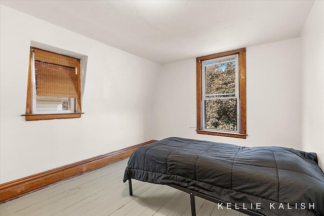 324 Gunnison Ave SW, Grand Rapids, MI 49504 - bedroom featuring wood finished floors and baseboards