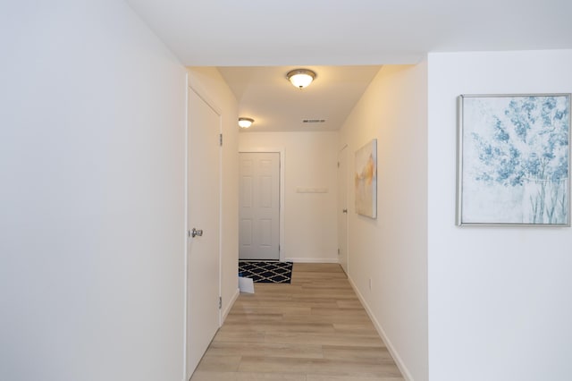 hallway featuring light hardwood / wood-style floors