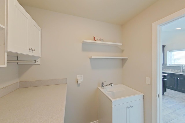 laundry room with a sink