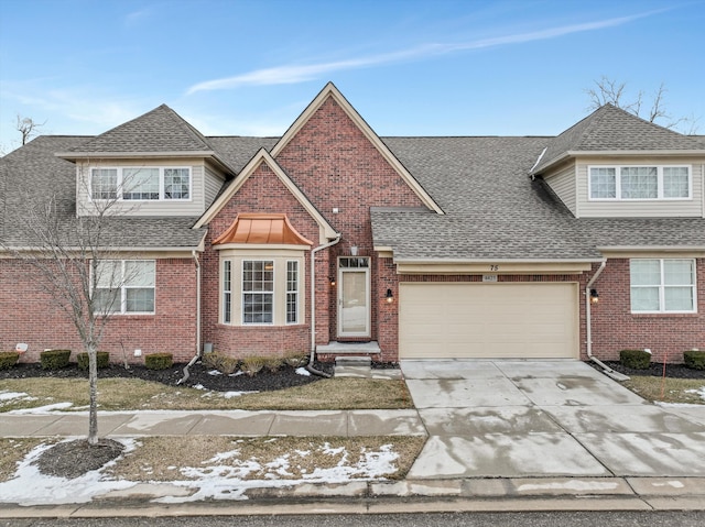 view of front of property featuring a garage