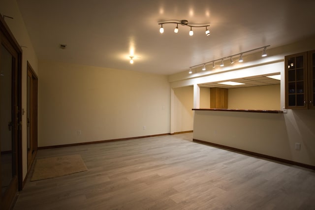 10773 Frankfort, Pinckney, MI 48169 - unfurnished room featuring hardwood / wood-style floors