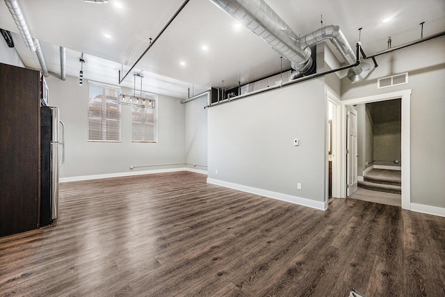 interior space with dark wood-type flooring