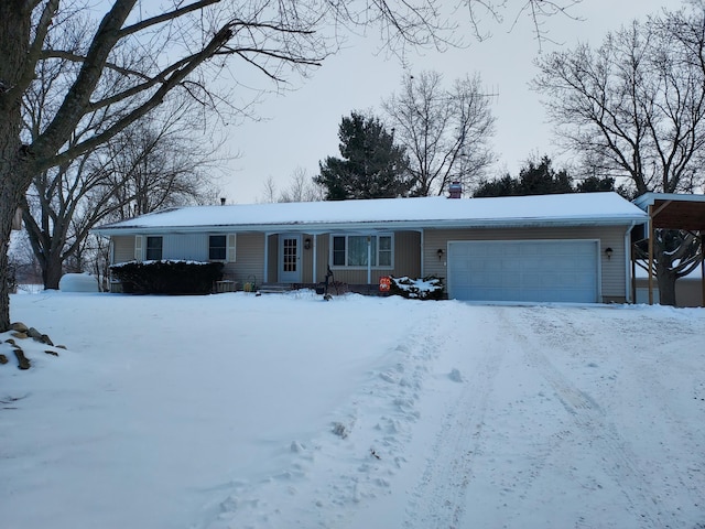 ranch-style house featuring a garage