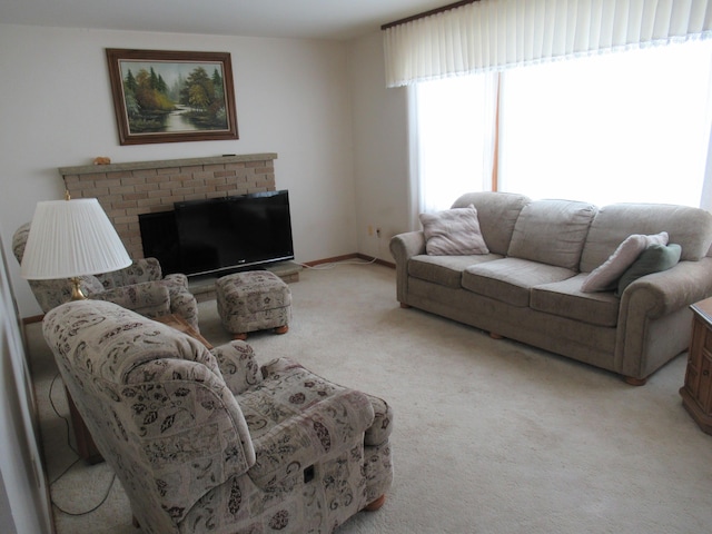 living room featuring a fireplace and light carpet