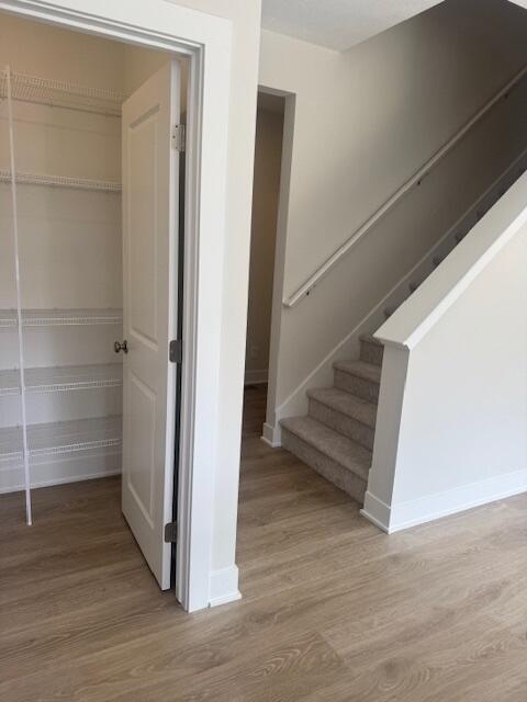1967 Lowe Dr, Spring Lake, MI 49456 - staircase with wood finished floors