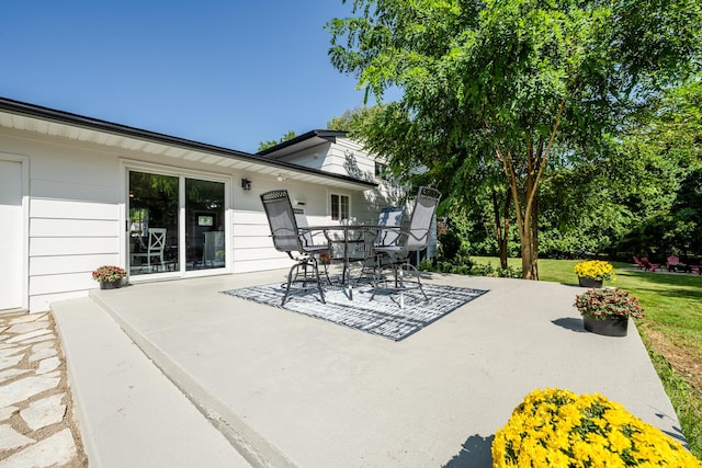 view of patio with outdoor dining space