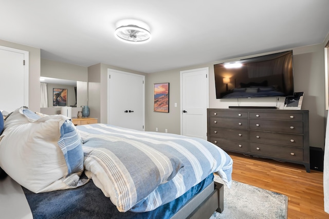 bedroom featuring light wood-style floors