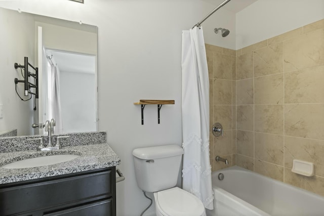 full bathroom featuring shower / tub combo, vanity, and toilet