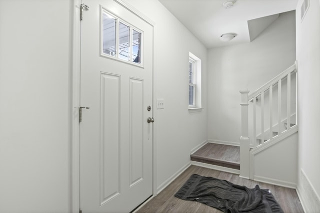 foyer featuring hardwood / wood-style flooring and a wealth of natural light