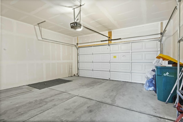 garage featuring a garage door opener