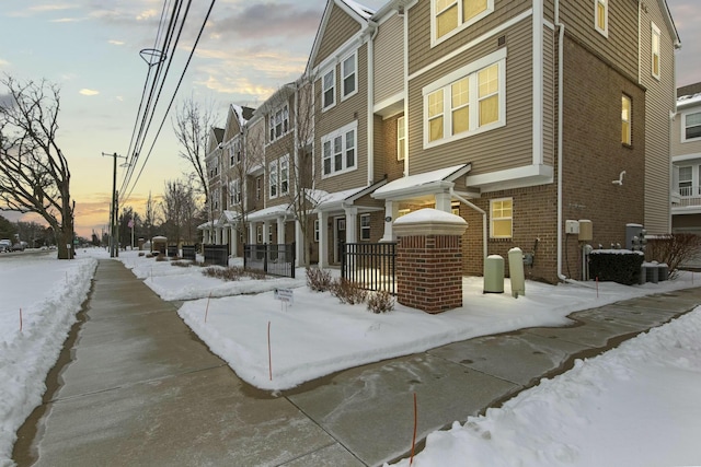 view of snow covered property