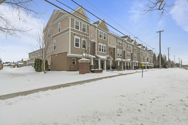 view of snow covered building