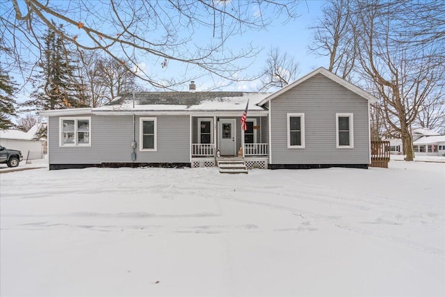 view of front of home featuring covered porch