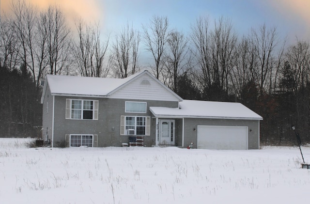 view of front of property featuring a garage